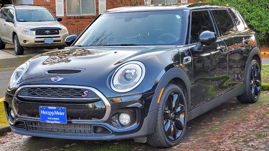 Angled view of a black Mini Cooper Clubman Sport